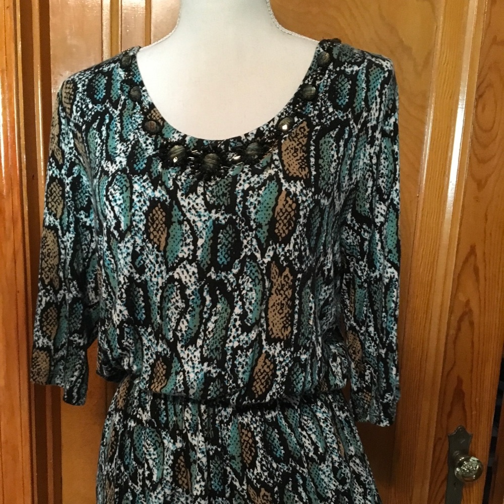 Gorgeous multicolored top with decorative neckline